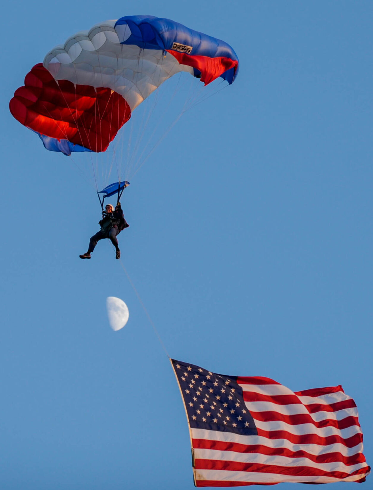 Skydiver at Cornhusker State Games with US flag
